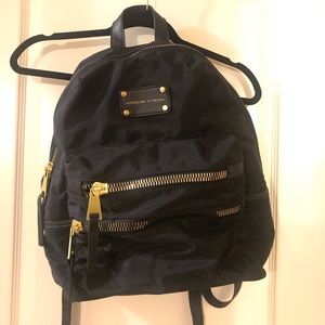 Black Backpack with Gold Accents